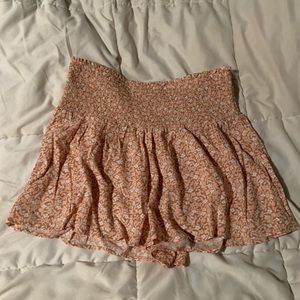 Orange, loose-fitting spring/summer shorts